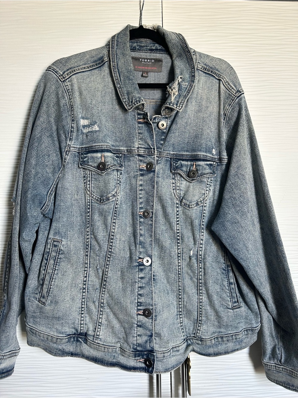 torrid Distressed Light Wash Denim Jacket in Faded Blue